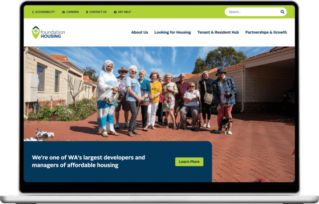 Foundation Housing website shown on a laptop