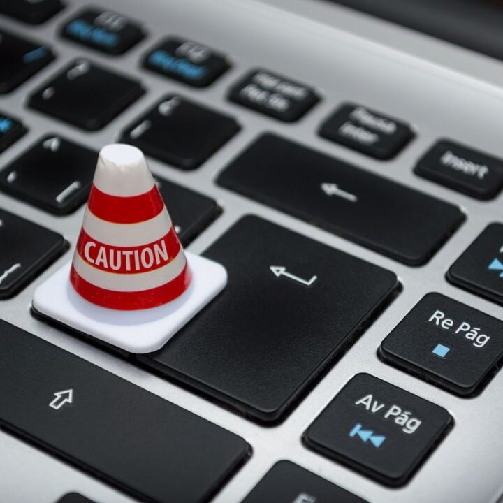 Caution cone on a laptop keyboard