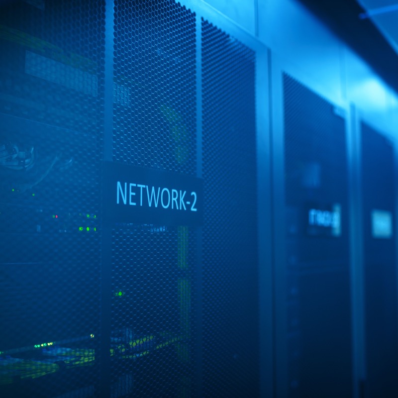 Blue-lit network racks in a data centre