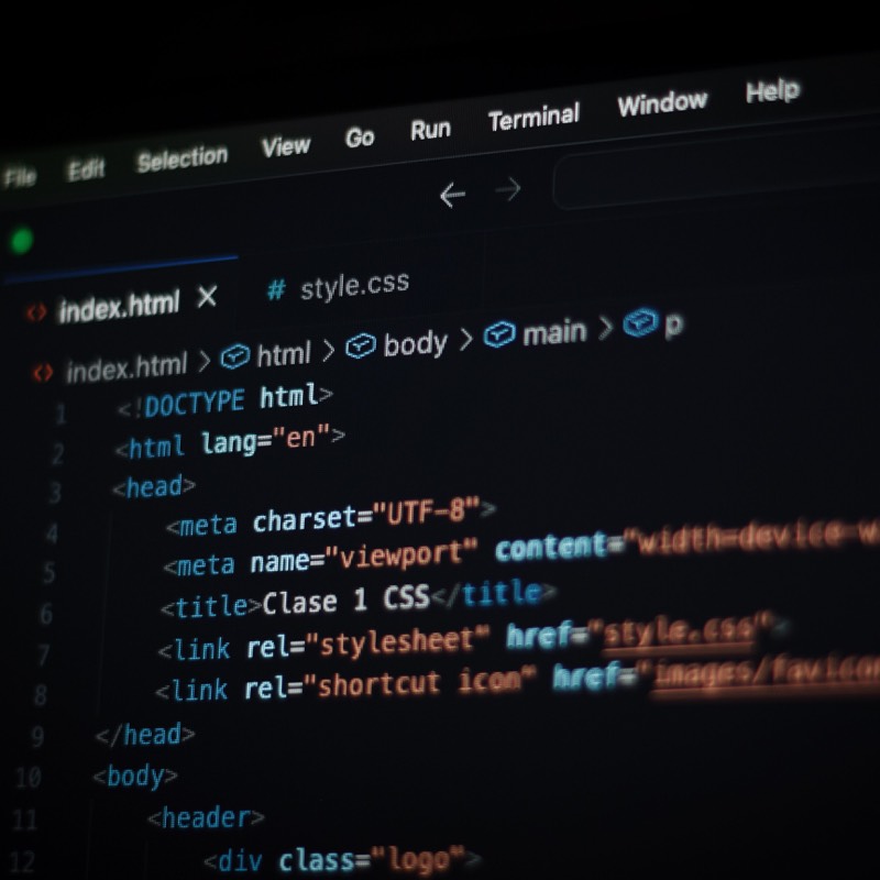 HTML and CSS source code displayed in a dark code editor
