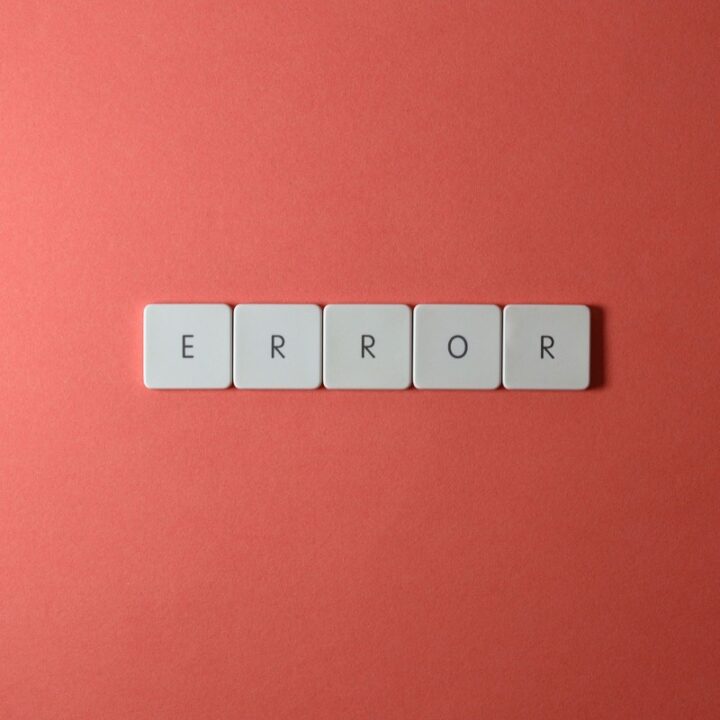 ERROR spelled with letter tiles on a plain background