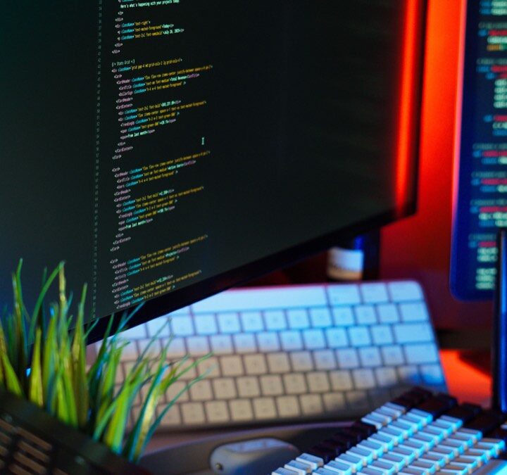 Coding screens in a dark workspace