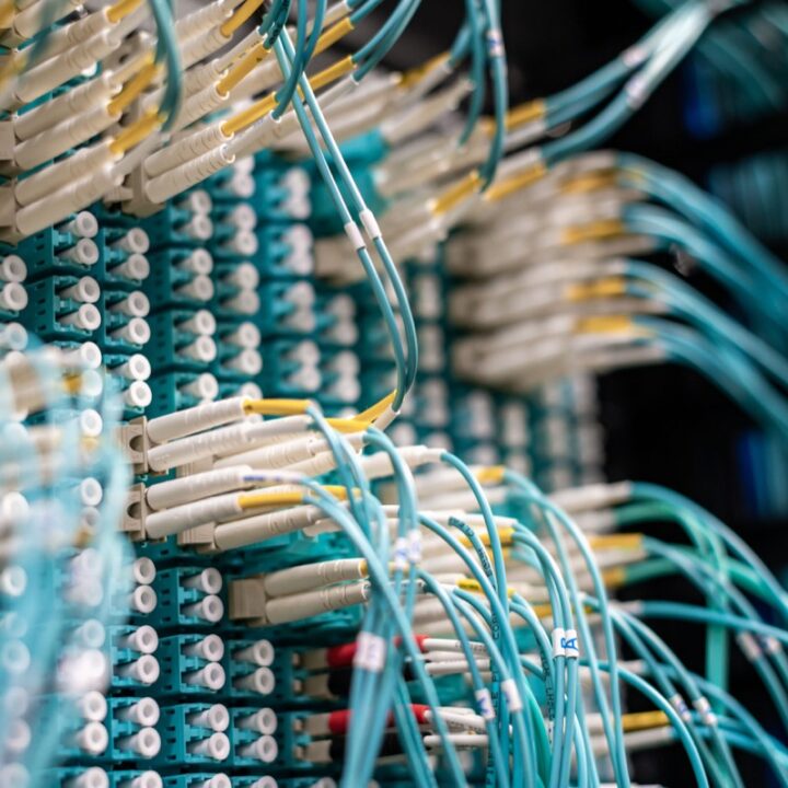 Network patch cables connected to a panel