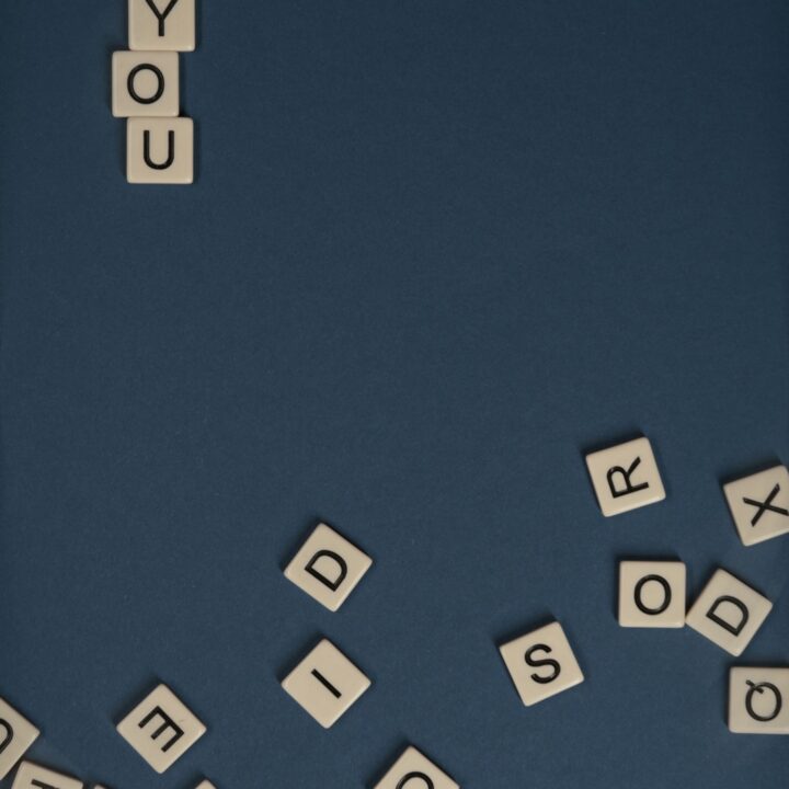 Scrabble letter tiles on a flat surface